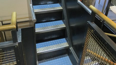 The black and blue stairs ascending to the crown at the Pedestal level.
