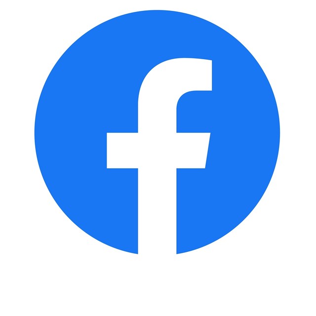 A blue filled in circle with a white lowercase 