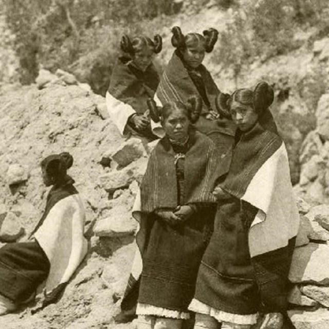 sepia photograph of several Hopi women in traditional dress, circa 1800s