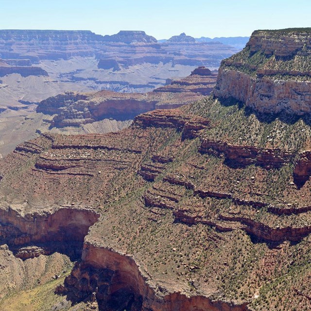 Deep canyon under a blue sky