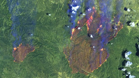 False color satellite image of wildfires burning in Arizona in 2002