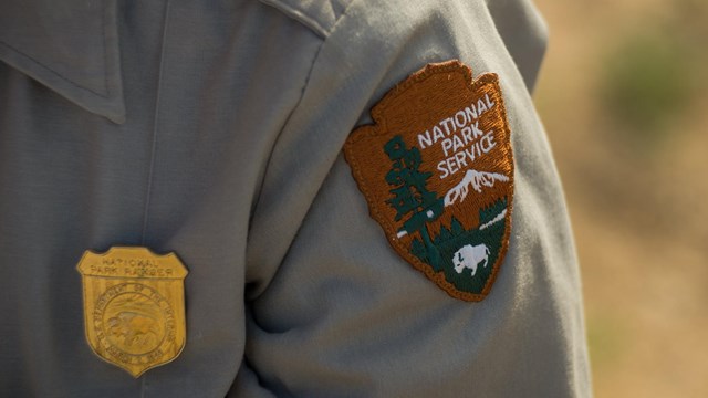 NPS Badge and patch on a ranger's uniform