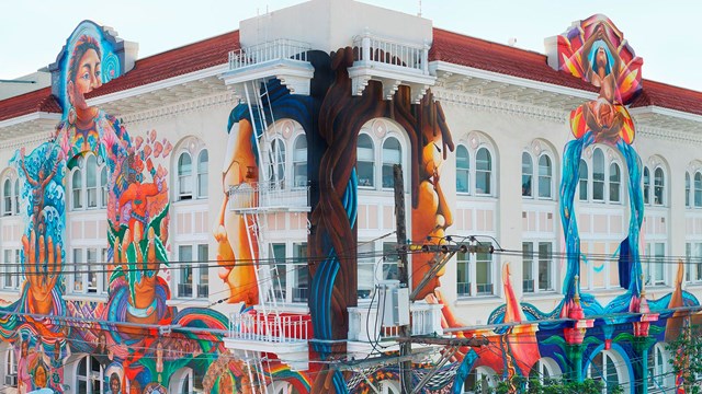Drone view of corner of the women's building murals on 18th street
