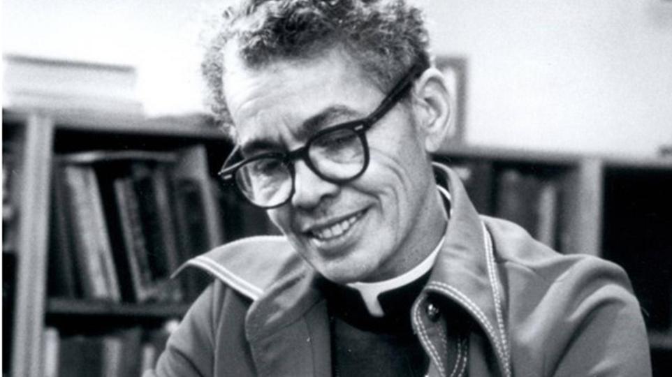 Pauli Murray studying in a library. UNC Chapel Hill Collections.