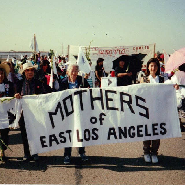 Group of women carrying a banner reading Mothers of East Los Angeles
