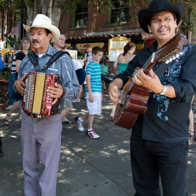 Street musicians on Olvera St., Los Angeles. C Highsmith. Library of Congress