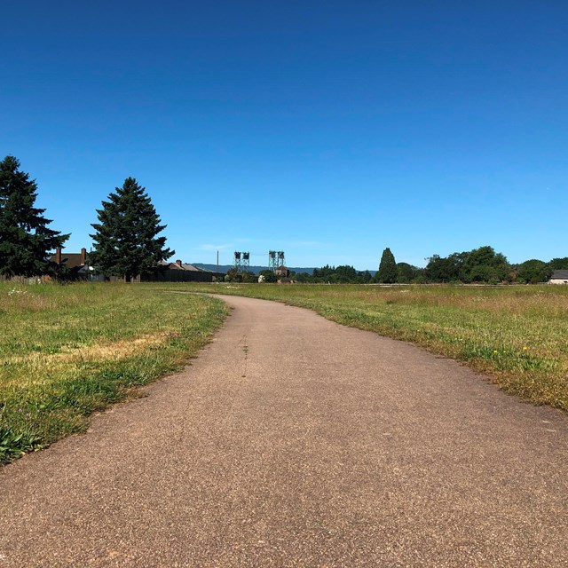 A paved trail on a sunny day
