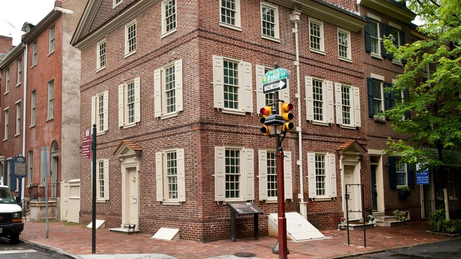 Color photo of exterior of Thaddeus Kosciuszko National Memorial a three story brick house.