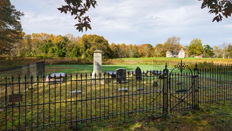 Stone Family Cemetery with iron fence and grave markers