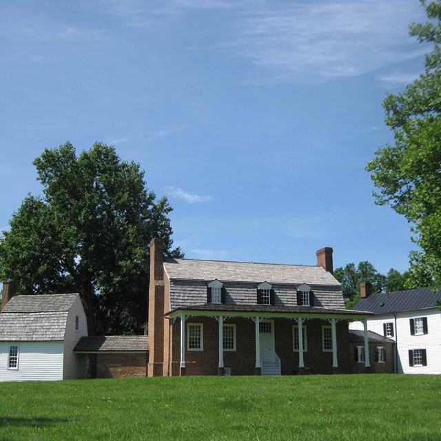 Brick house with dormers and four other segments