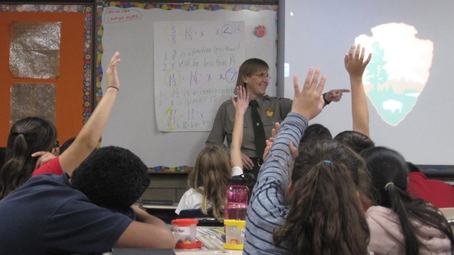 Ranger pointing at a student in a classroom
