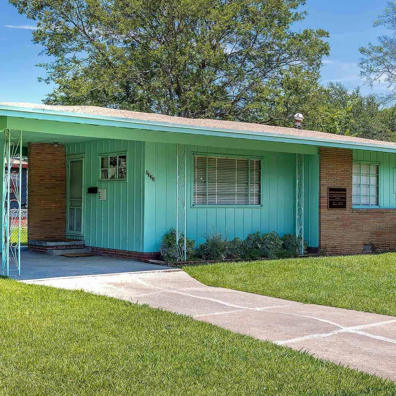 Blue bungalow-style home