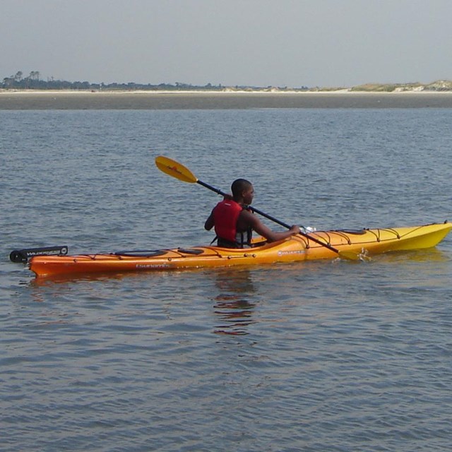 2 kayaks in water 