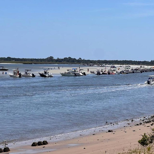 boats on sandbar