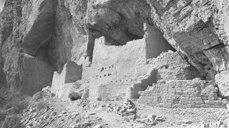 A black and white photo of the Upper Cliff Dwelling.