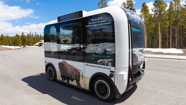 Automated shuttle with a buffalo on the side in Yellowstone