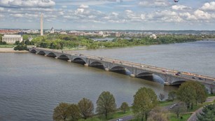 looking across river, bridge on right, washington monument in left background