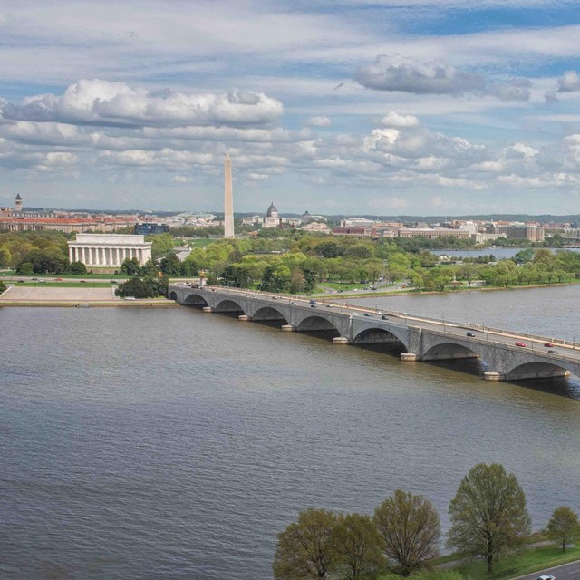 looking across river, bridge on right, washington monument in left background