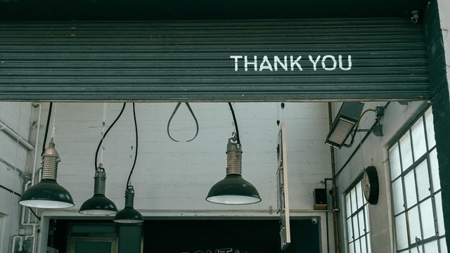 'thank you' painted on a door