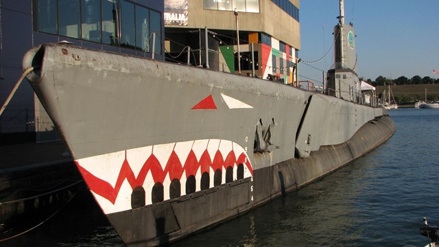 USS Torsk painted as a shark docked in Baltimore's Inner Harbor. 