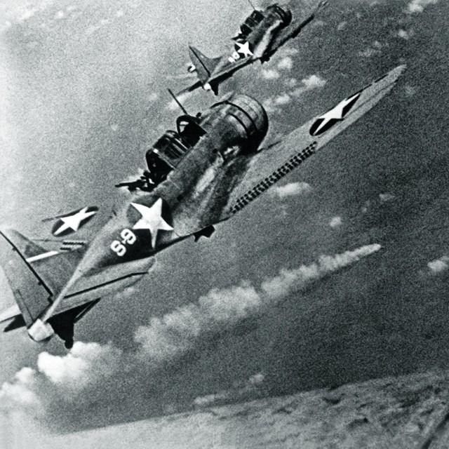 Photo of a plane in combat. 