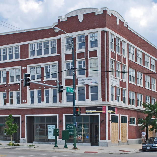 Large red brick building. 