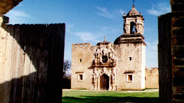 Photo of an old mission church made of stone. NPS photo.