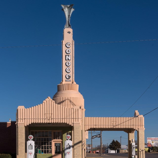 Photo of concrete filling station with tower. Library of Congress. 