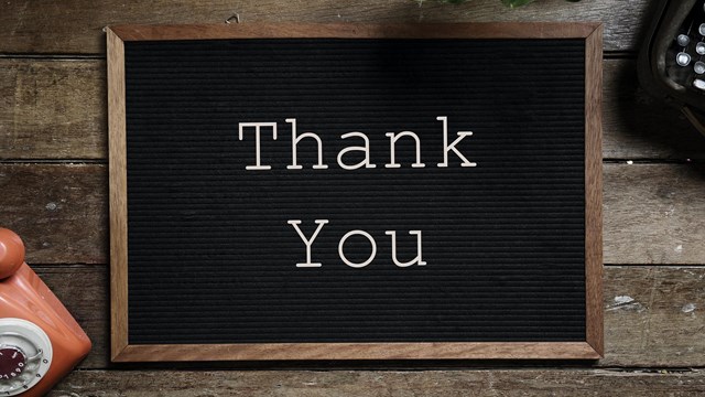 letter board spelling out 'thank you'