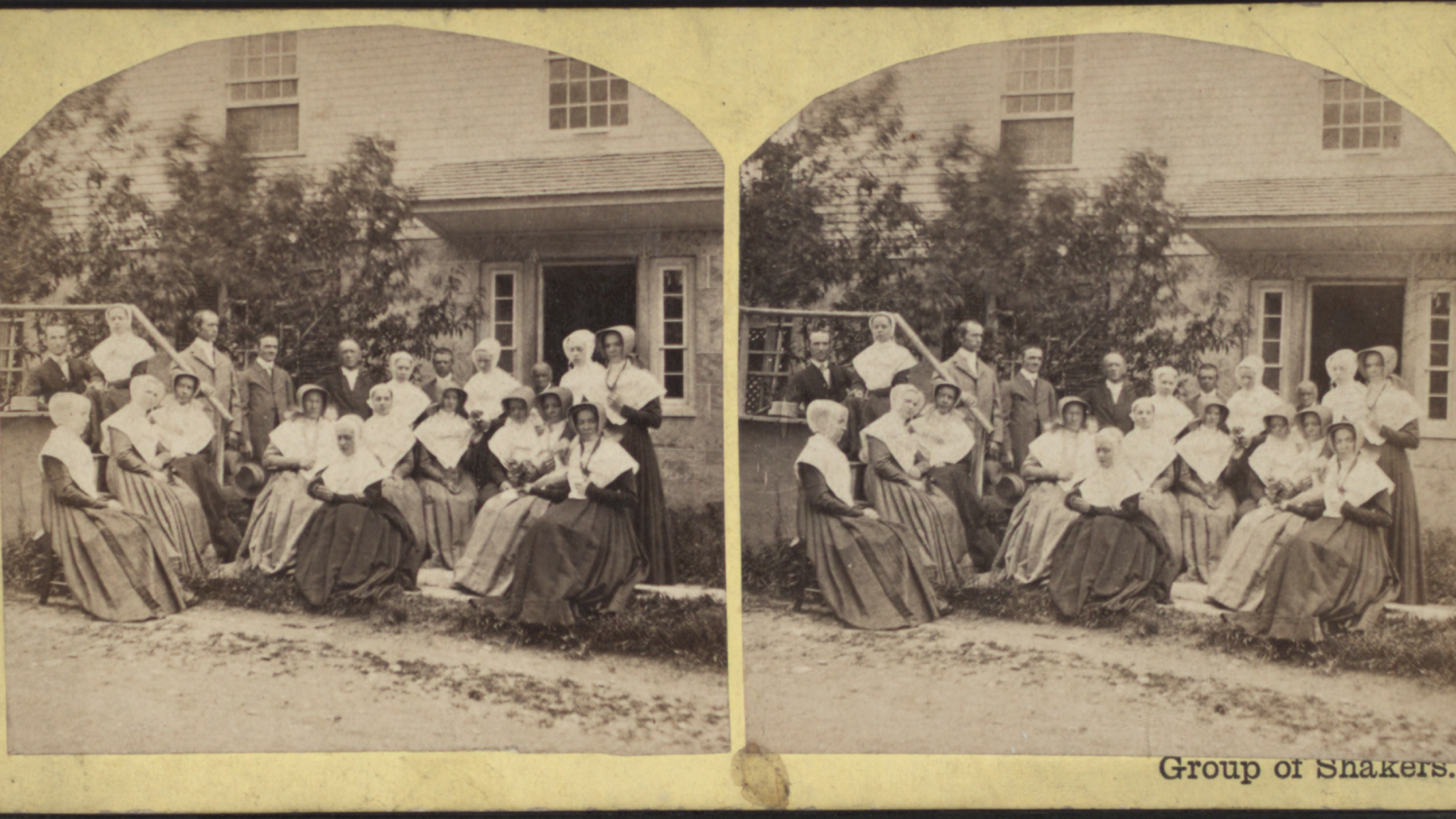 historic photo of a group of shakers sitting outside