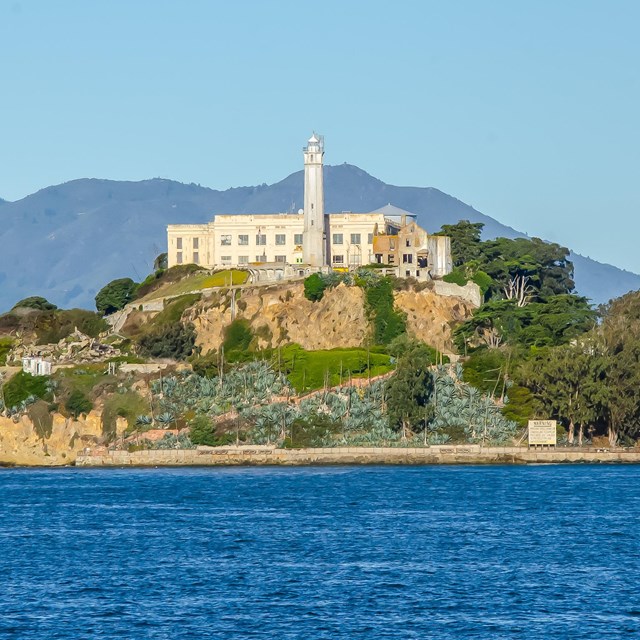 Photo of island and buildings from across the water. NPS photo. 