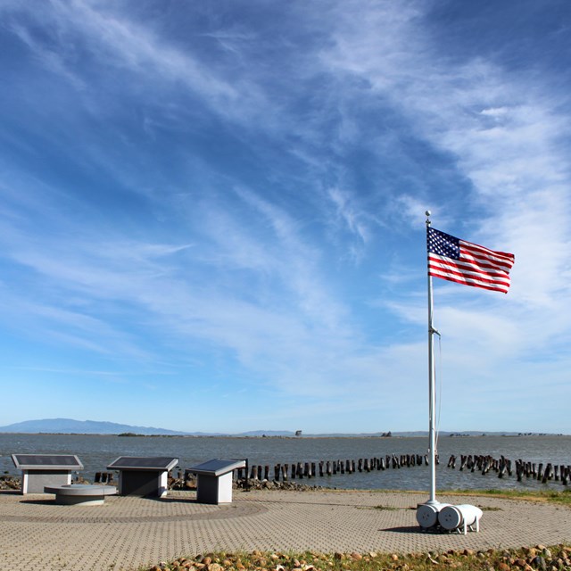 Port Chicago Naval Magazine National Memorial with American flag. CC0 