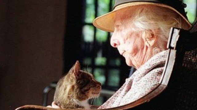 Closeup of Douglas holding a cat. By Friends of the Everglades, CC BY-SA 3.0