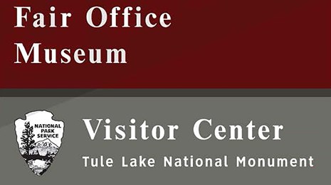 Sign with NPS arrowhead that says Fair Office, Museum, Visitor Center Tule Lake National Monument