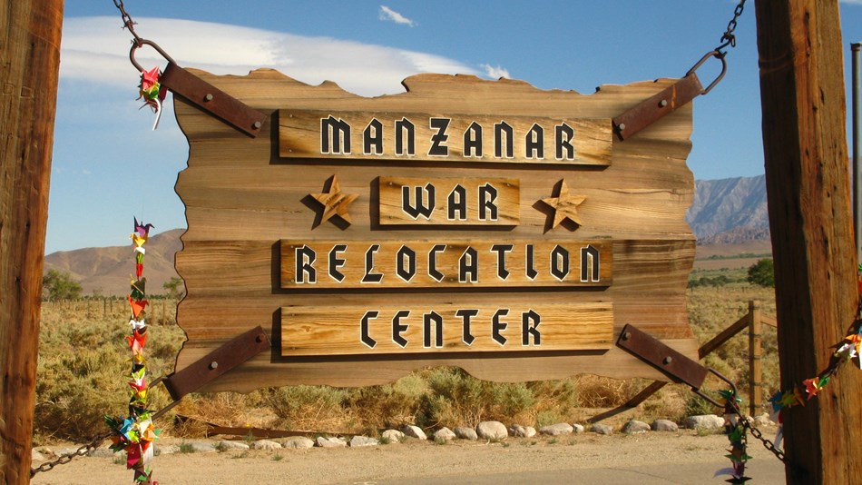 Wooden sign that states Manzanar War Relocation Center