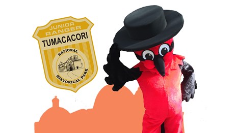 vermilion flycatcher mascot with black hat, bowing