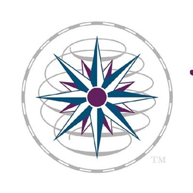 Eight-point star surrounded by circle and text that reads 