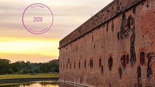 A photograph of Fort Pulaski with a Digital Passport® Stamp in the left hand corner.