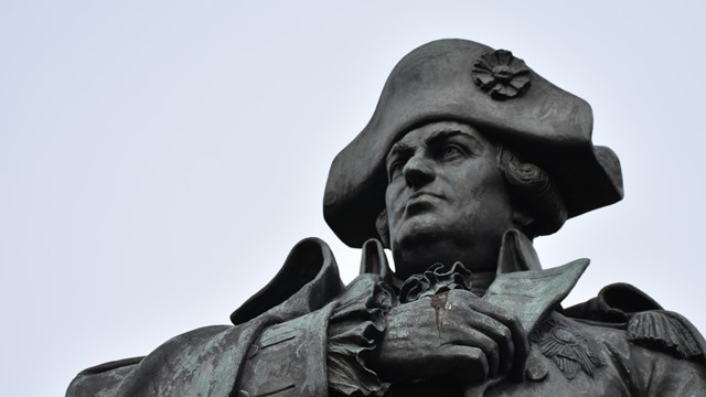 The head and shoulders of a statue of a Continental Army General.