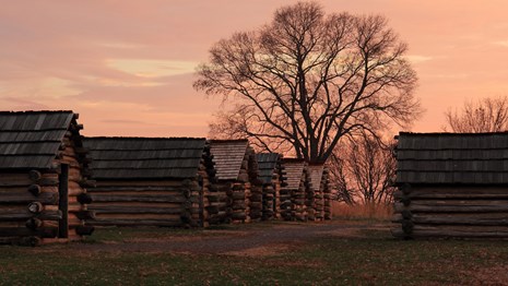 Huts at sunrise.