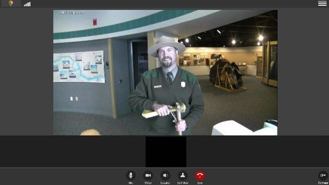A park ranger speaks to us virtually through a computer program.
