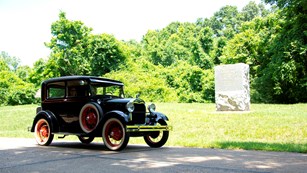 historic car on the park tour road