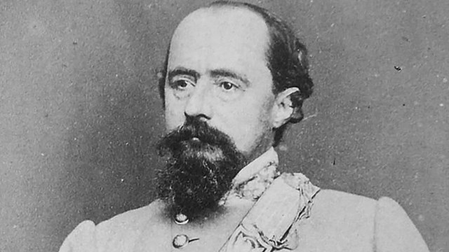 A black and white image of William Loring holding his sword with missing arm.