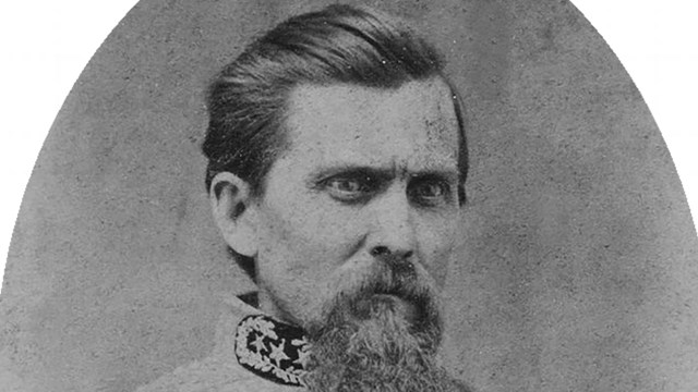 A black and white image of John Walker in Confederate generals uniform.
