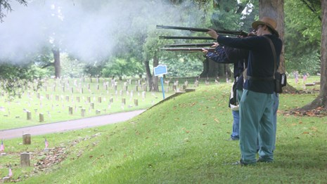 Soldiers firing civil war muskets