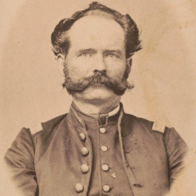 A Union officer with large mustache.