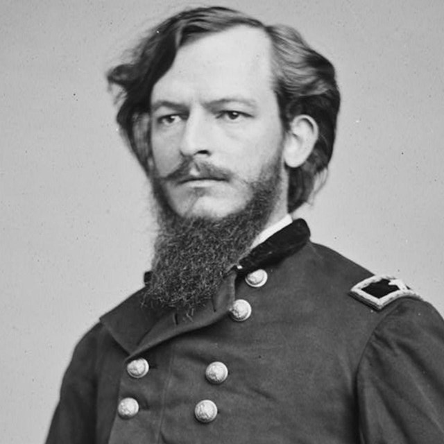 A Union general with thin mustache and long, pointy beard.