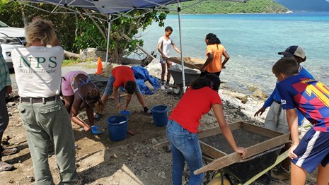 Archeologist Ken Wilde leads a team of local students as they excavate a site on St. John.
