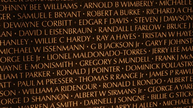 Names on the Vietnam Veterans Memorial wall.