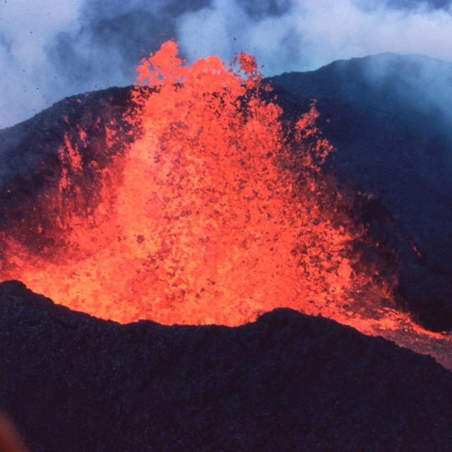 volcanic vent with erupting lava fountain